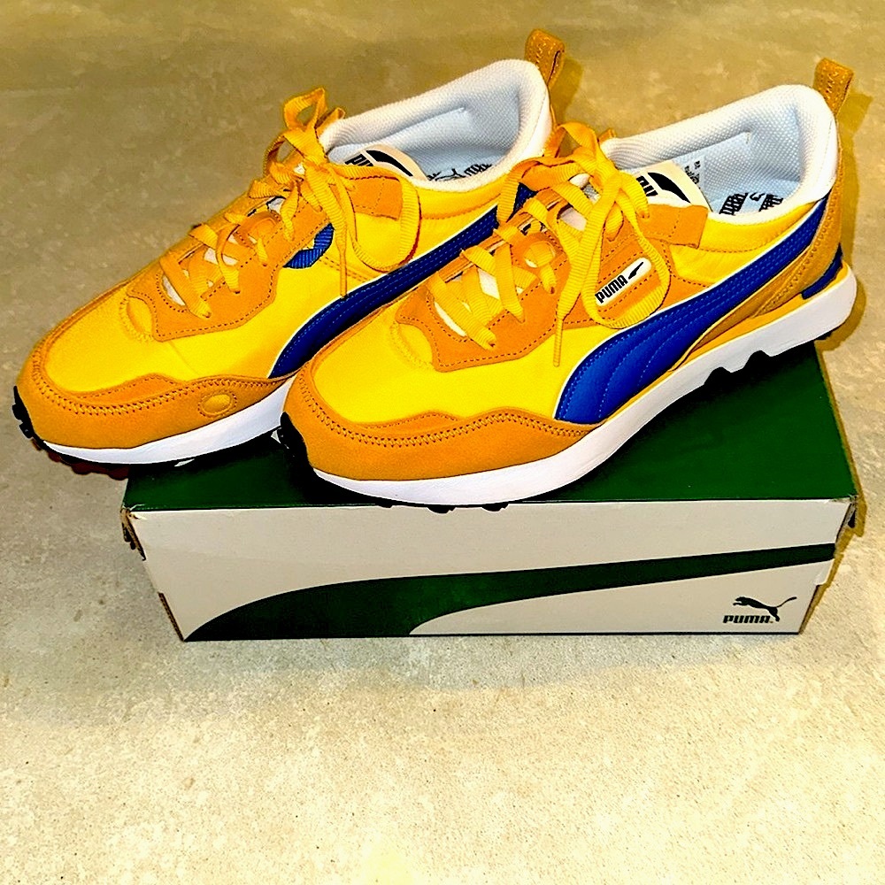 Men’s size 10 Puma Rider FV Essentials in tangerine-orange brick. New in box.